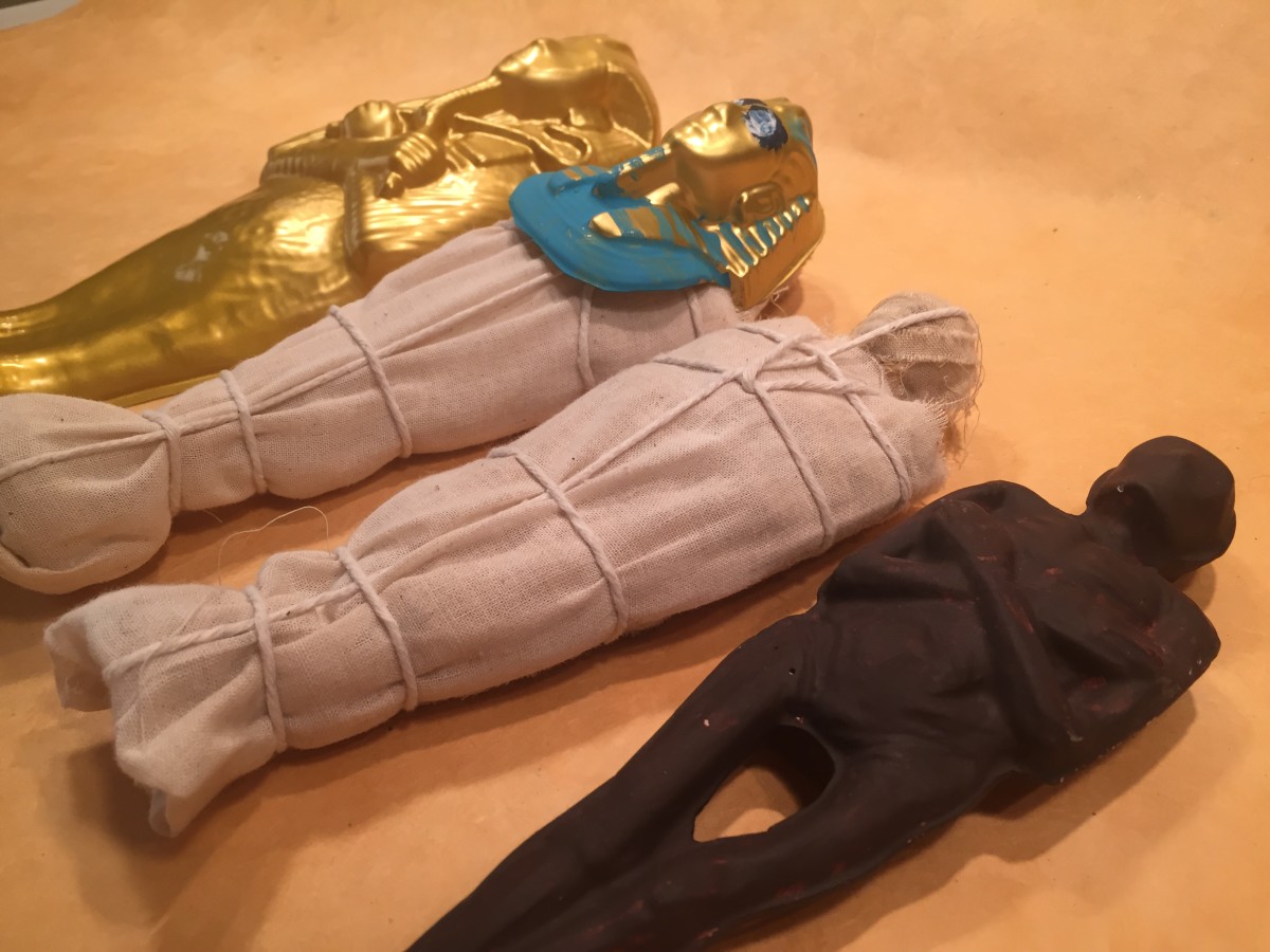 How can one build an ancient Egyptian mummy and tomb for a school project?